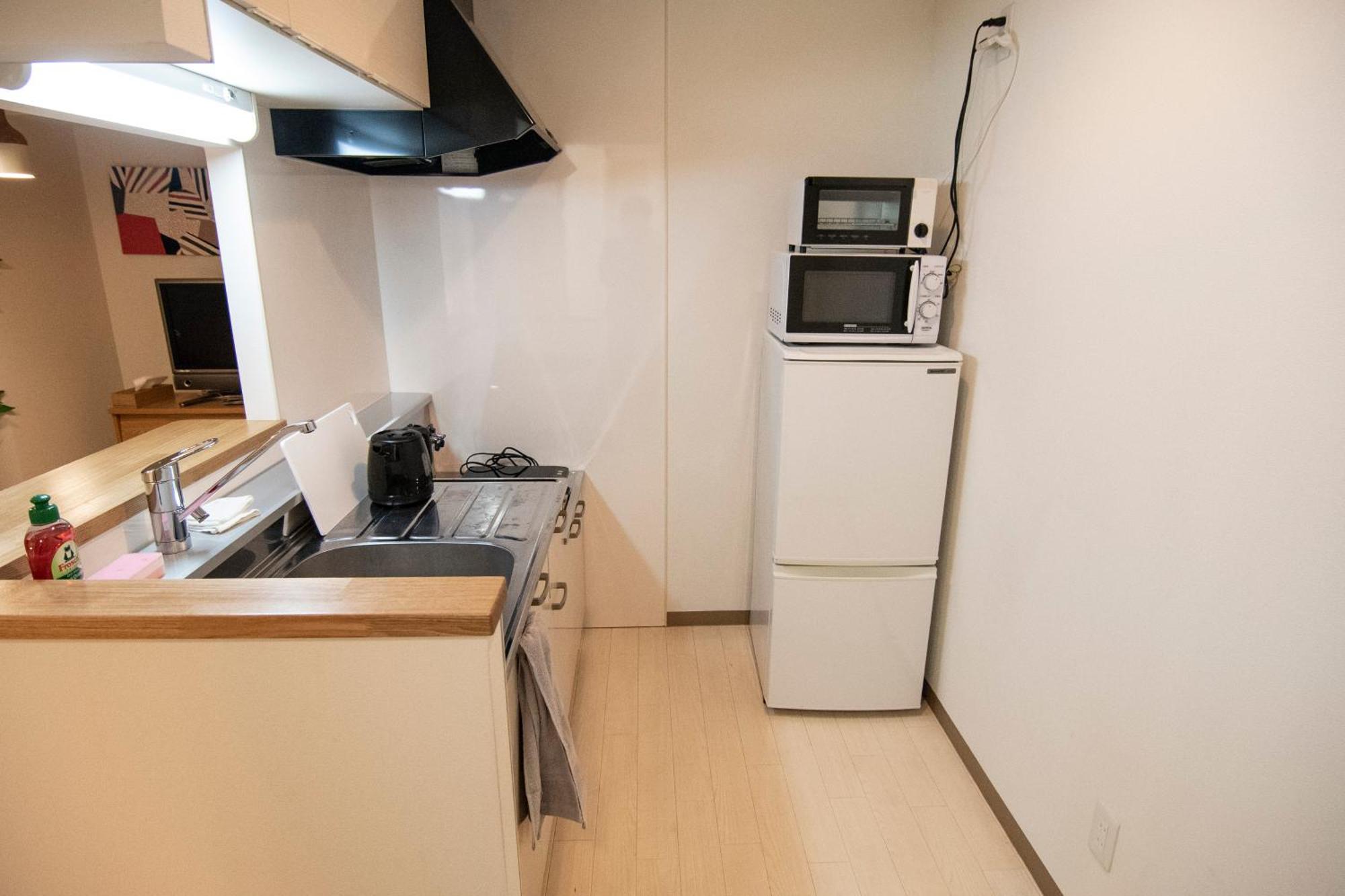 Tsubaki Garden Apartamento Sapporo Quarto foto