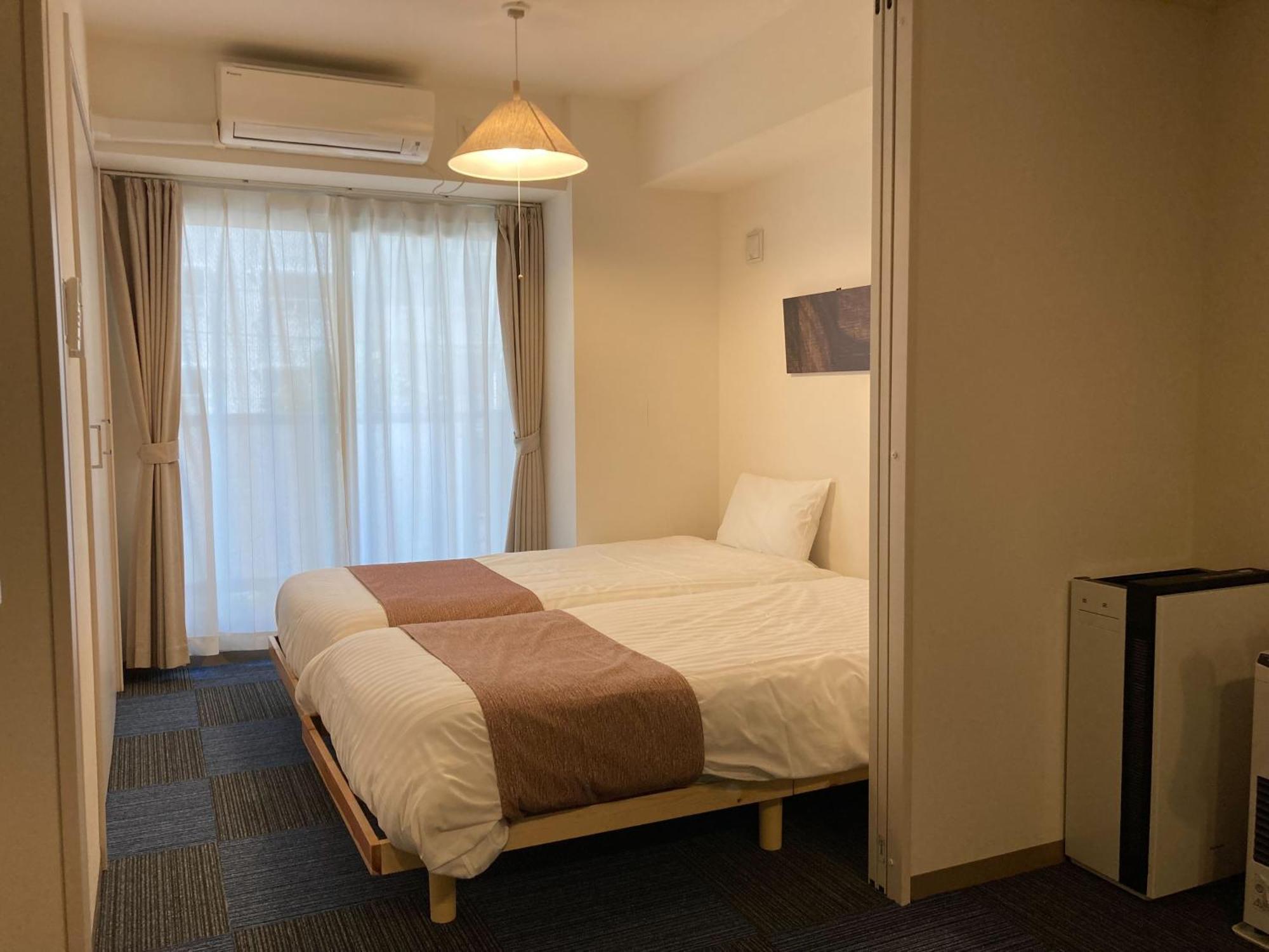 Tsubaki Garden Apartamento Sapporo Quarto foto