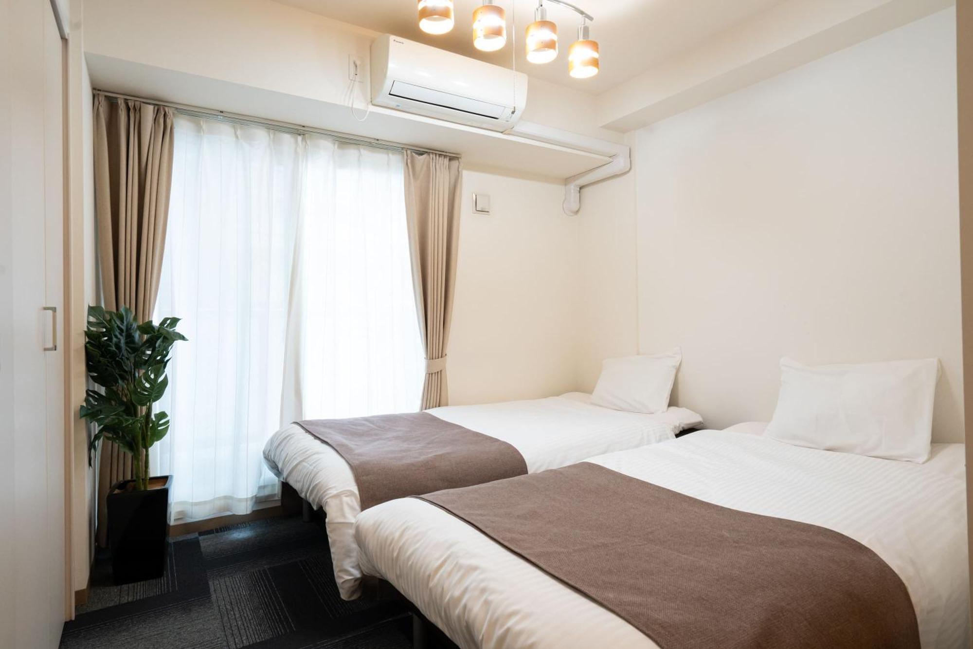 Tsubaki Garden Apartamento Sapporo Quarto foto