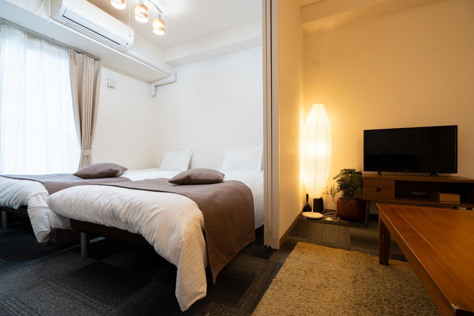 Tsubaki Garden Apartamento Sapporo Quarto foto
